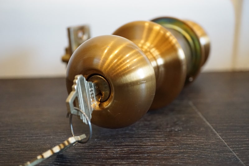 A piece of new hardware with a key protruding from the lock. Our locksmiths love to install replacement door locks and hardware at your home.